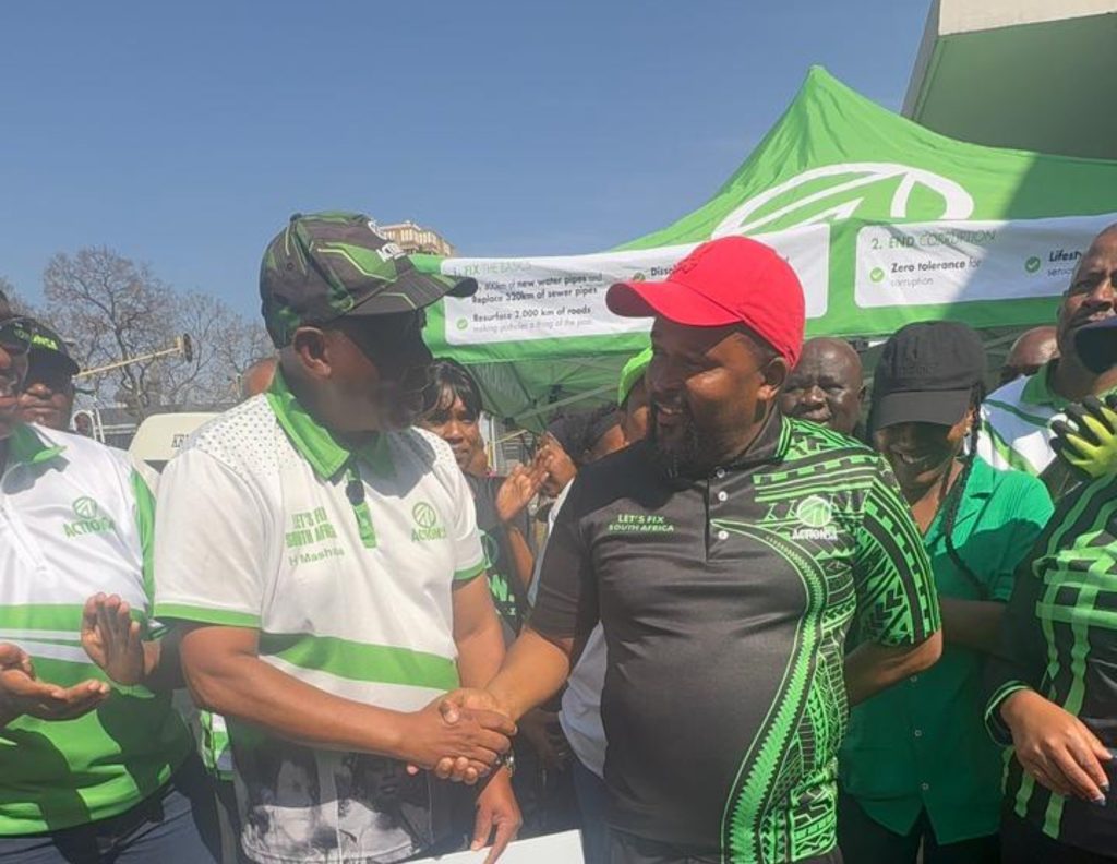 Thabang Moshidi with Herman Mashaba
